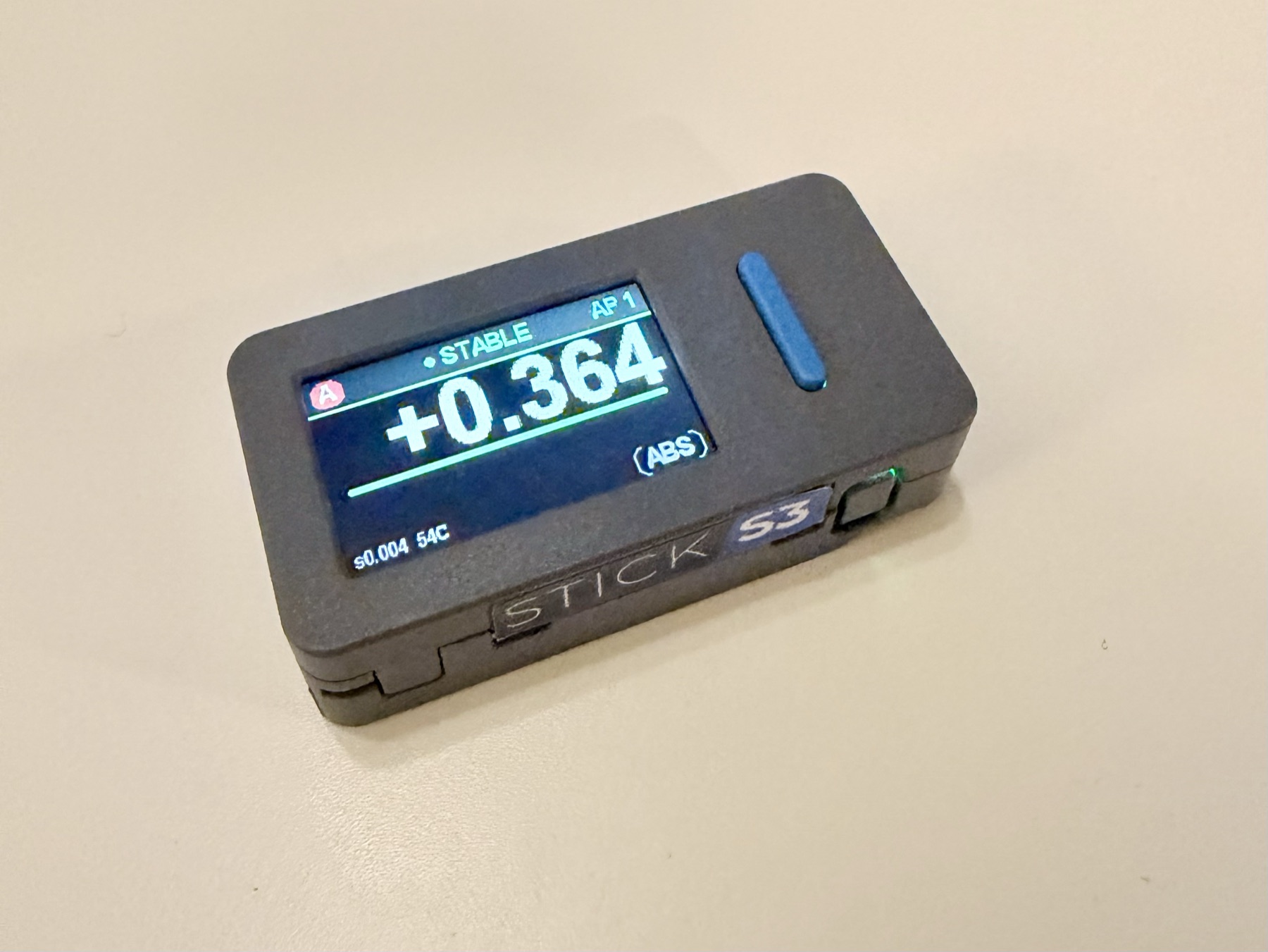 An Angle Gauge node in a printed case, screen reading plus 0.364 degrees, marked STABLE.